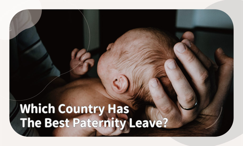 which country has the best paternity leave dad holding baby