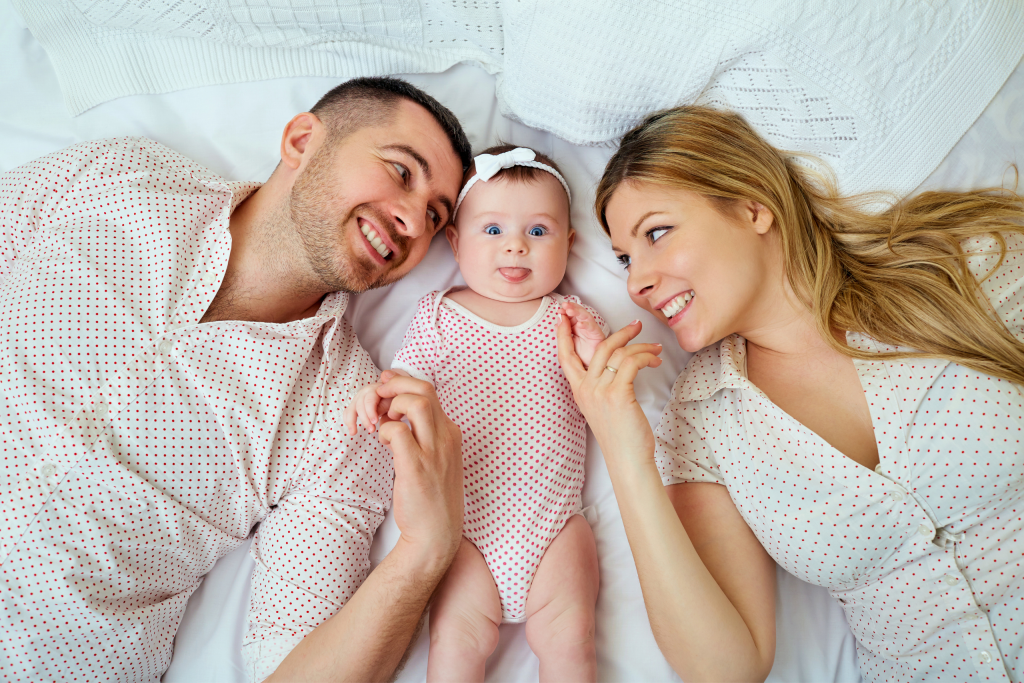 baby sleeping safe and soundly with parents