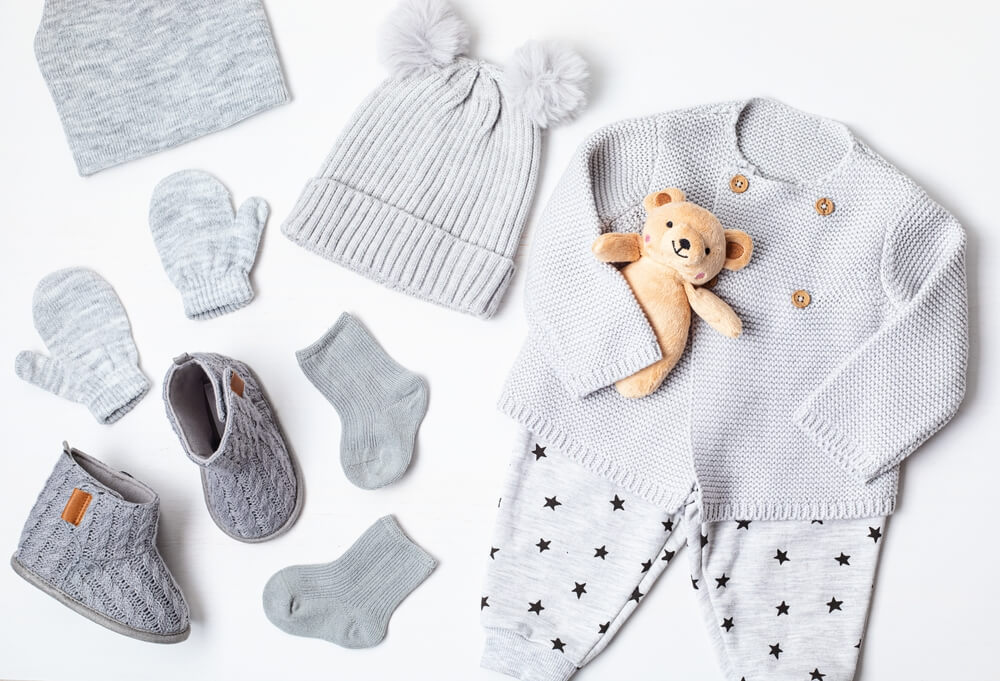 Cozy baby mittens and sleep clothes.
